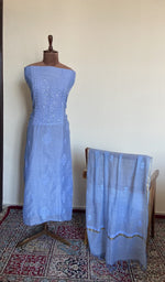 The set on the mannequin with its dupatta beside it