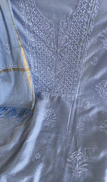 Fine chikankari on gala and boota on the periwinkle blue kurta