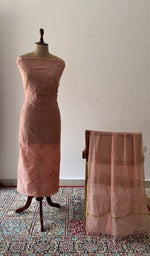The set on the mannequin with its dupatta beside it