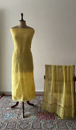 The set on the mannequin with its dupatta beside it