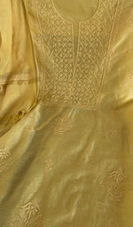 Motifs across the body of the yellow kurta