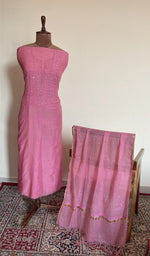 Pink mul chanderi set on the mannequin with its dupatta