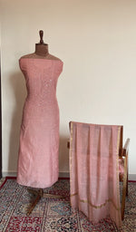 Onion pink mul chanderi set on the mannequin with its dupatta