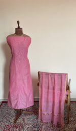 Carnation pink mul chanderi set on the mannequin with its dupatta
