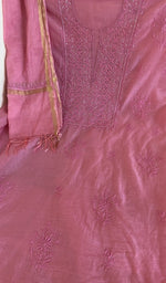 Carnation pink mul chanderi laid flat on the table