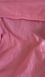 Close view of the carnation pink kurta fabric
