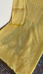 Kurta laid flat with the dupatta, fine chikankari on gala and boota
