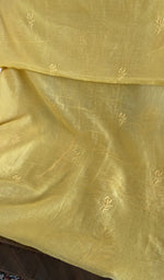 The dupatta spread out, butter yellow mul chanderi