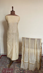 Cream mul chanderi set on the mannequin with its dupatta