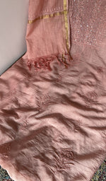 Close look at the fine chikankari on gala and boota with beads and sequins