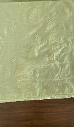 Hand embroidery on pista green mul chanderi