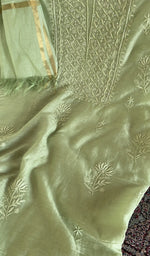 Fine chikankari on gala and boota on the pista green mul chanderi