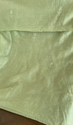 Close view of the pista green kurta fabric