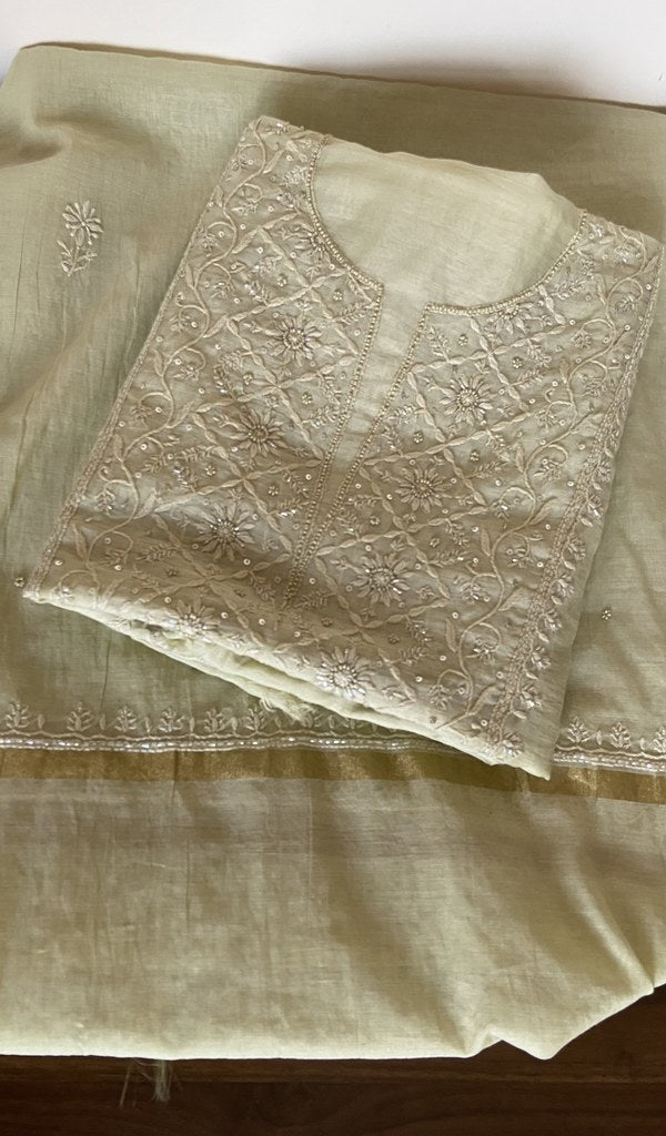 Folded sage green mul chanderi kurta, gala and neckline work