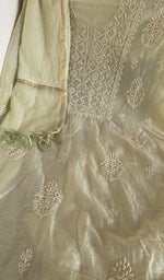Sage green mul chanderi laid flat on the table