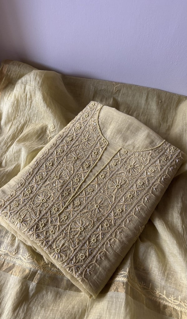 Beige pure mul chanderi kurta piece folded, fine chikankari on gala and boota with beads and sequins
