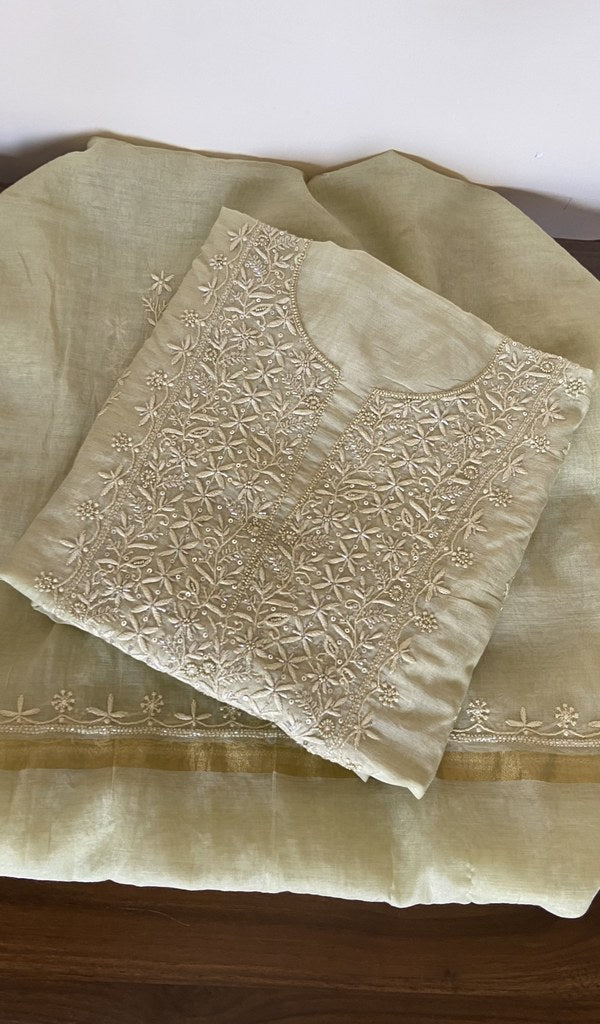 Folded pale green mul chanderi kurta, gala and neckline work