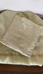 Folded pale green mul chanderi kurta, gala and neckline work