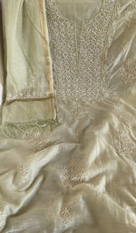 Pale green mul chanderi laid flat on the table