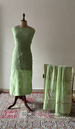 The set on the mannequin with its dupatta beside it