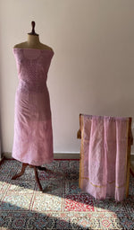 The set on the mannequin with its dupatta beside it