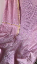 Motifs across the body of the lilac kurta