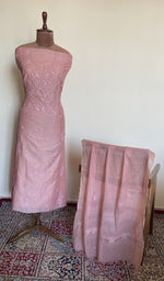 The set on the mannequin with its dupatta beside it