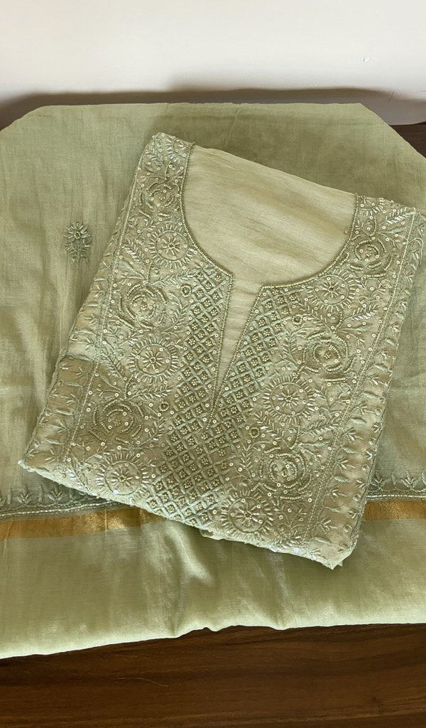 Folded mint green mul chanderi kurta, gala and neckline work