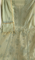 Mint green mul chanderi laid flat on the table