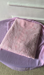 The folded set, kurta on top
