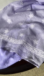 border and hem of the purple kurta piece