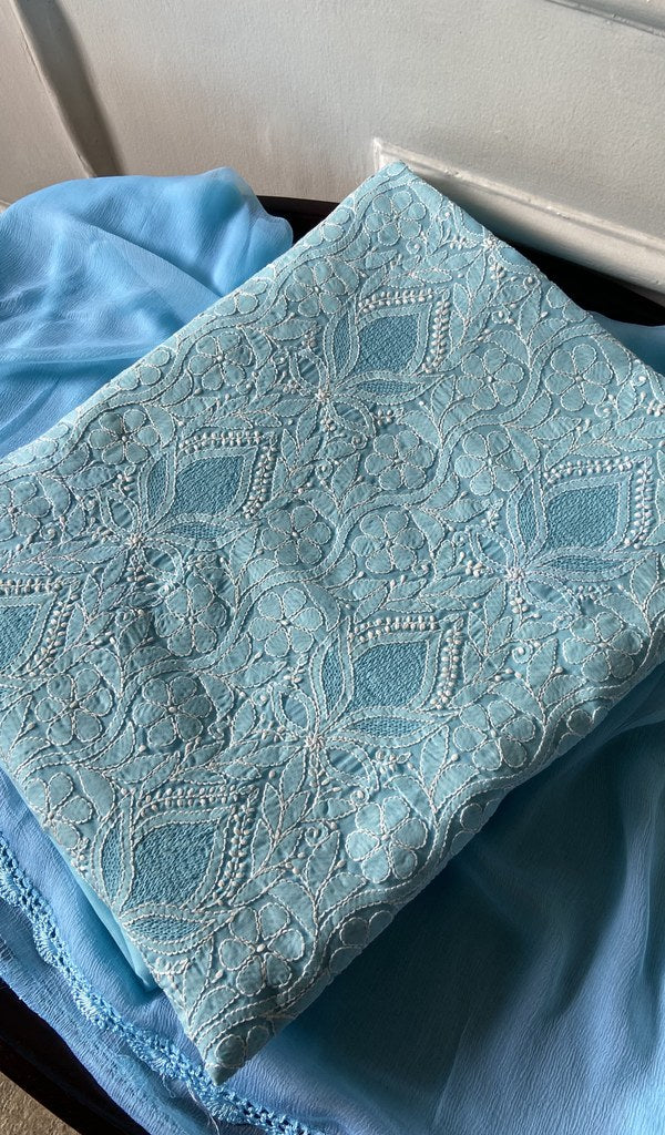 deep blue cotton chikankari suit set, folded