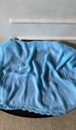 bottom laid out, deep blue cotton