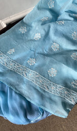 border and hem of the deep blue kurta piece