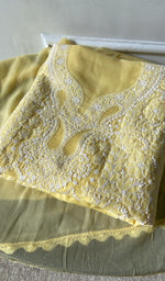 yellow cotton chikankari suit set, folded