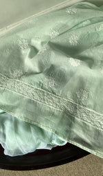 border and hem of the mint kurta piece