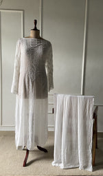 The set on the mannequin with its dupatta beside it
