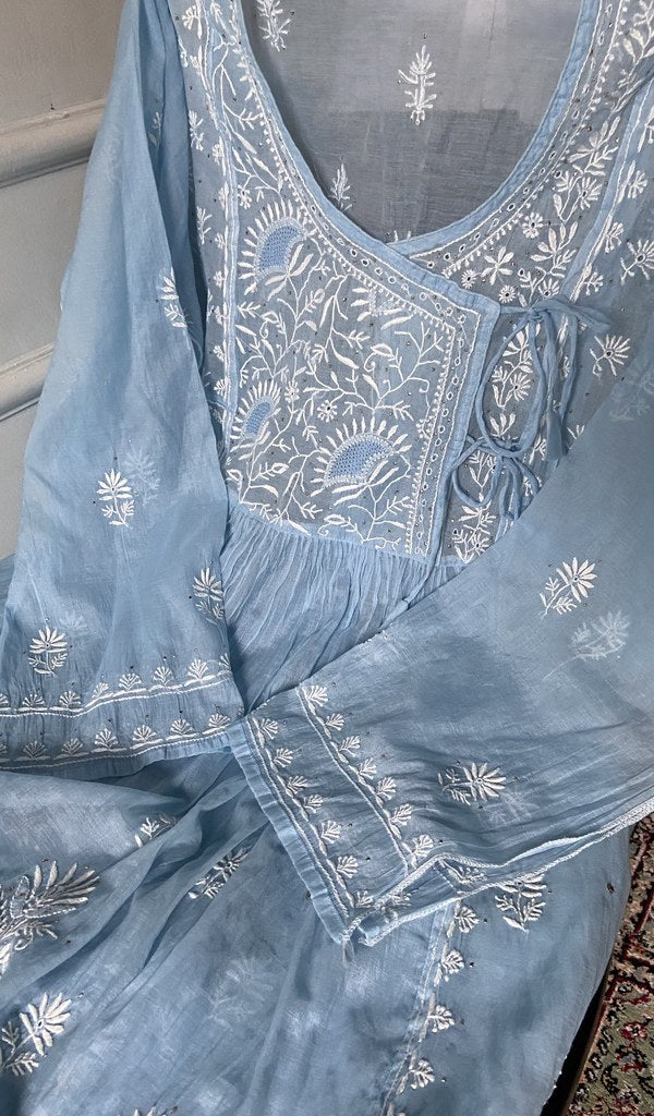 close view of the hand embroidery, light blue pure mul chanderi