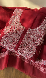Folded maroon faux georgette kurta, front view