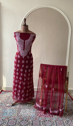 Maroon faux georgette set on the mannequin with its dupatta