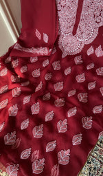 Fine chikankari on the maroon faux georgette