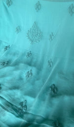 Hand embroidery on turquoise faux georgette