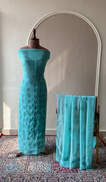 Turquoise faux georgette set on the mannequin with its dupatta