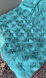 Turquoise faux georgette kurta, close view of the embroidery