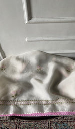 White pure organza silk laid over the stool