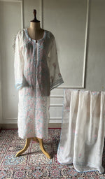 White pure organza silk chikankari suit set on the mannequin, dupatta alongside