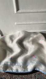 White pure organza silk laid over the stool