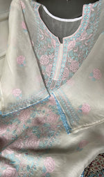 Close view of the chikankari on the white kurta