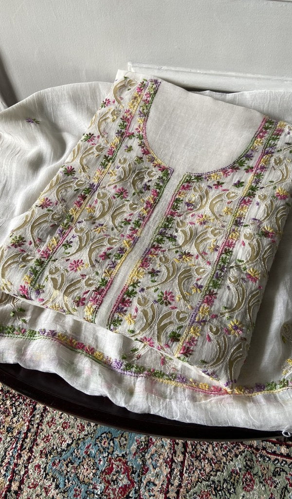 cream chikankari set folded, worked panel on top