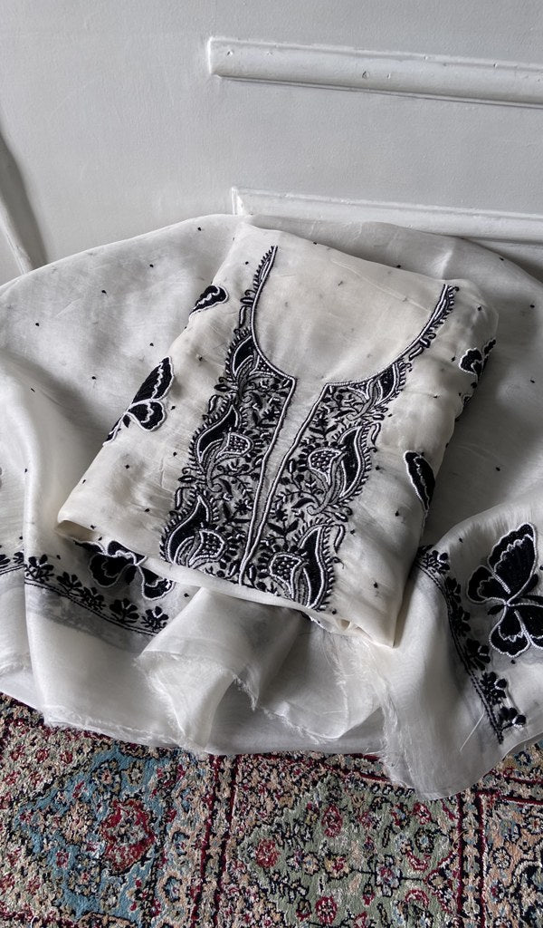 white pure organza silk chikankari 2 pc unstitched suit set, folded